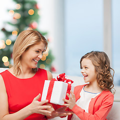 Image showing happy mother and child girl with gift box