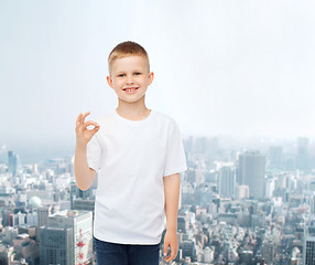 Image showing smiling little boy in white blank t-shirt