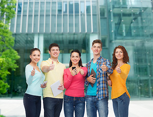 Image showing group of teenagers with smartphones and tablet pc