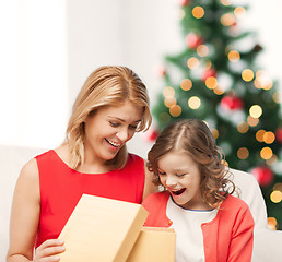 Image showing happy mother and child girl with gift box