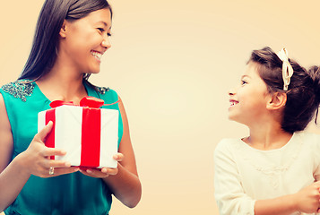 Image showing happy mother and child girl with gift box