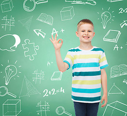 Image showing little boy in casual clothes making OK gesture