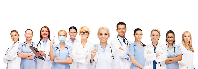 Image showing smiling doctors and nurses with stethoscope