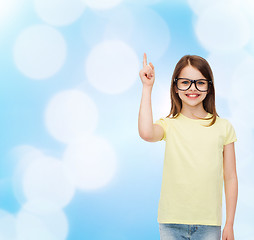 Image showing smiling cute little girl in black eyeglasses