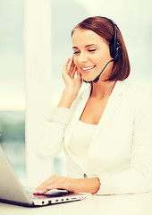 Image showing friendly female helpline operator