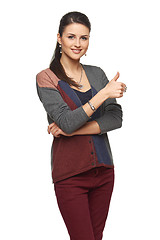 Image showing Gorgeous young brunette showing big thumbs up on white background.