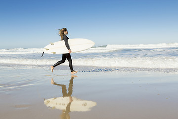 Image showing Surfer girl