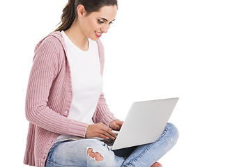 Image showing Female student with a laptop