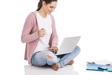 Image showing Female student with a laptop