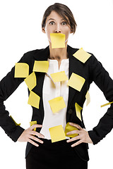 Image showing Woman with yellow paper notes