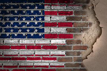 Image showing Dark brick wall with plaster - USA