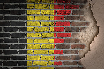 Image showing Dark brick wall with plaster - Belgium