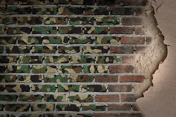 Image showing Dark brick wall with plaster - Army camouflage