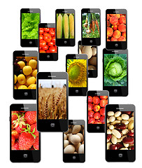 Image showing Modern mobile phones with different images