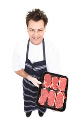 Image showing Butcher with fresh meat