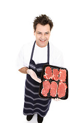 Image showing Butcher displaying some beef