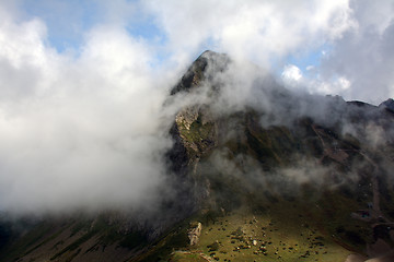 Image showing A mountain behind the cloud