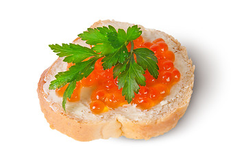 Image showing Red caviar on the bread and butter