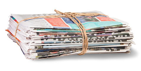 Image showing Stack Of Newspapers Bandaged Rope