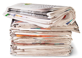 Image showing Stack Of Newspapers And The Roll