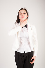 Image showing Depressed young businesswoman with sore throat