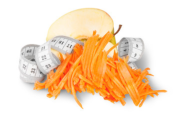Image showing Half An Apple With Grated Carrots And Sewing Measuring