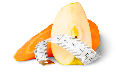 Image showing Slices Carrot With Apple And Sewing Measuring