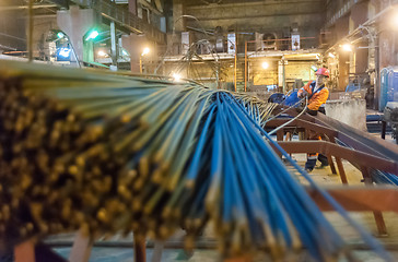 Image showing Worker in reinforcing shop