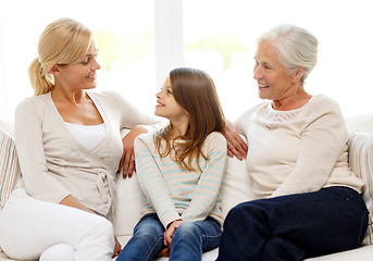 Image showing smiling family at home