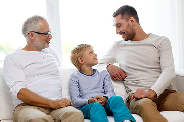 Image showing smiling family at home