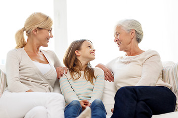 Image showing smiling family at home