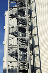 Image showing modern fire escape twisted sunlit