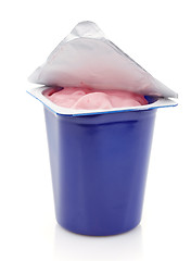 Image showing fresh pink berry yogurt in blue plastic pot