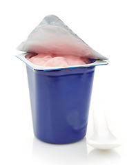 Image showing fresh pink berry yogurt in blue plastic pot