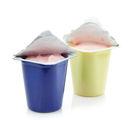 Image showing two plastic yogurt pots