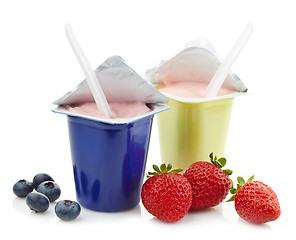 Image showing two plastic yogurt pots