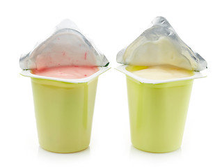 Image showing two plastic yogurt pots