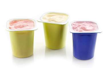 Image showing various plastic yogurt pots