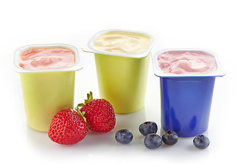 Image showing various plastic yogurt pots