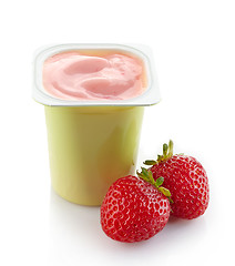 Image showing fresh pink strawberry yogurt in plastic pot