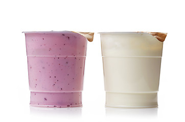 Image showing two plastic yogurt pots