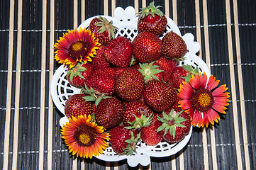 Image showing Strawberry and flower.