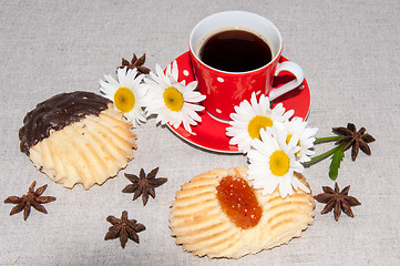 Image showing A cup of coffee and shortbread cookies