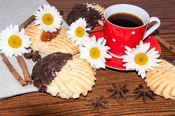 Image showing A cup of coffee and shortbread cookies