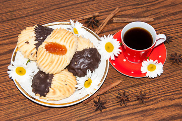 Image showing A cup of coffee and shortbread cookies