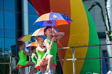 Image showing The girls performed a dance with umbrellas