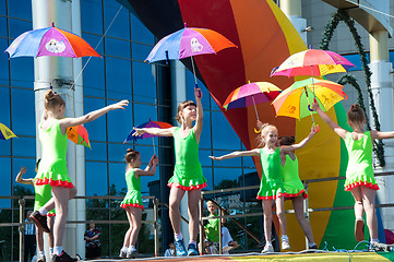 Image showing The girls performed a dance with umbrellas