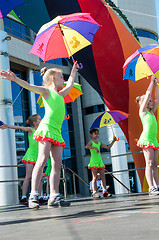 Image showing The girls performed a dance with umbrellas