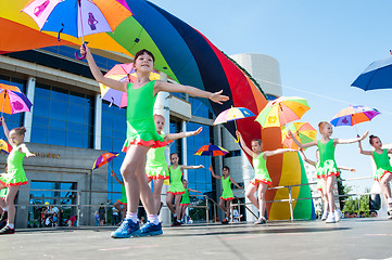 Image showing The girls performed a dance with umbrellas