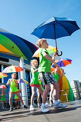 Image showing The girls performed a dance with umbrellas